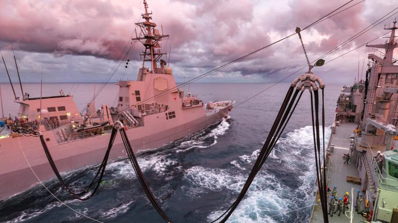 HMAS Supply conducts a replenishment at sea with HMAS Sydney off the east coast of Australia. Photo: Able Seaman Jarryd Capper