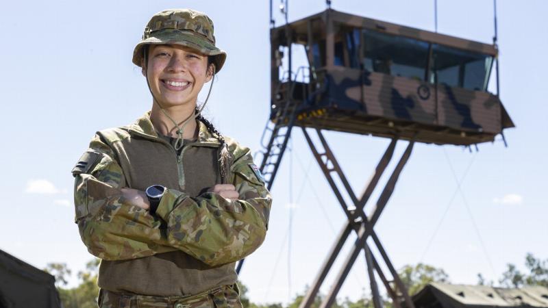 Royal Australian Air Force Flight Lieutenant Janet Mulder from No. 452 Squadron Amberley Flight, in front of the Air Traffic Control Tower, during Exercise Vigilant Scimitar at Charters Towers Airport, Queensland. Photo: Corporal Jarrod McAneney
