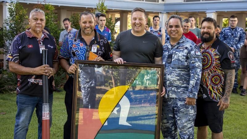 Mr Les Huddlestone, left, Mr James Parfitt from Larrakia Nation, Wing Commander Jim Collisson, Flight Lieutenant Norm Grogan and Mr Trent Lee from Larrakia Nation. Photo: Sergeant Pete Gammie