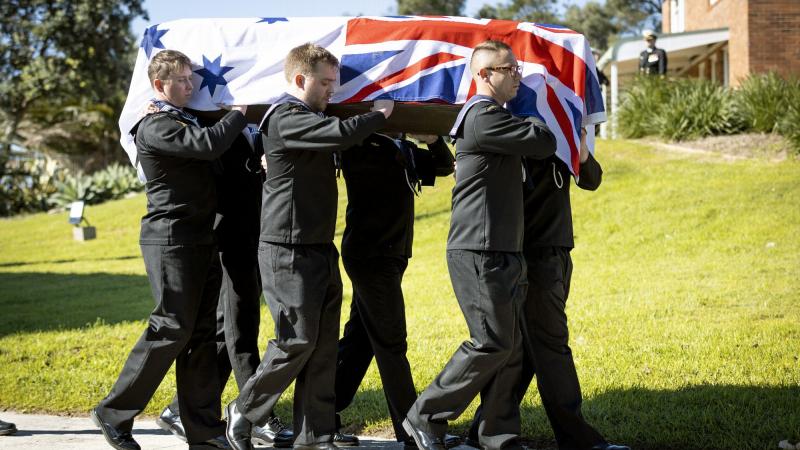 Royal Australian Navy pallbearers carry the casket after the Service Funeral for Rear Admiral (retd) Geoffrey James Alexander Bayliss, held at HMAS Watson Chapel, Sydney. Photo: Able Seaman Susan Mossop