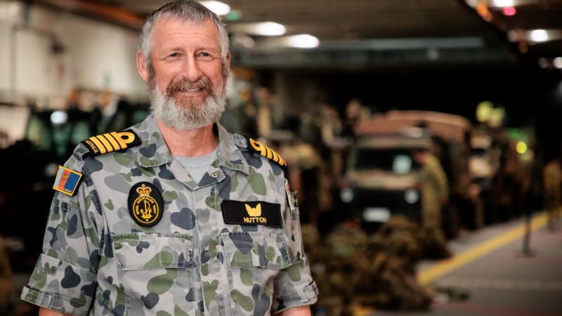 Captain Jim Hutton on the light vehicle deck of HMAS Adelaide during Exercise Sea Explorer. Photo: Corporal Robert Whitmore