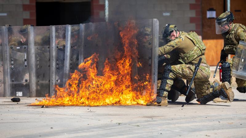 Australian Army soldiers from the 3rd Battalion, Royal Australian Regiment and 1st Military Police Battalion participate in a population protection control course at Townsville Field Training Area, Queensland. Photo: Corporal Daniel Sallai