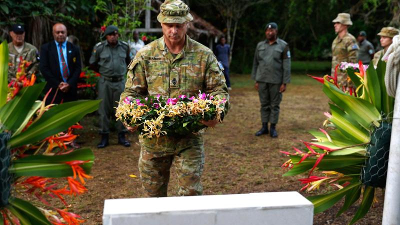 Australian Defence Force officer Lieutenant Colonel Tim Warner lays a wreath during Fiji's Infantry Day commemoration service at Vilu War Memorial, Solomon Islands. Photo: Corporal Julia Whitwell