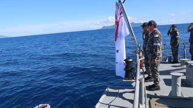 A memorial wreath is cast from HMAS Ararat’s quarterdeck over the final resting place of HMAS Canberra 1 near Savo Island, Solomon Islands.