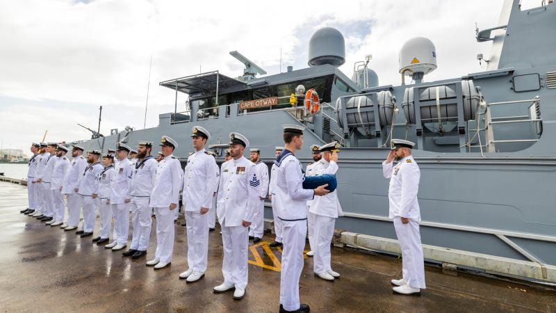 Deputy Chief of Navy Rear Admiral Christopher Smith inspects the ship's company of Australian Defence Vessel Cape Otway during the boat's official welcome to its home port of Cairns. Photo: Able Seaman Susan Mossop 