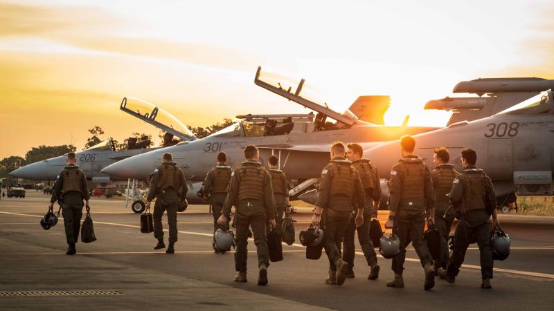 Aircrew from No. 1 and No. 6 squadrons on the flightline at RAAF Base Darwin in the Northern Territory during Exercise Diamond Storm 2022. Photo: Leading Aircraftman Sam Price