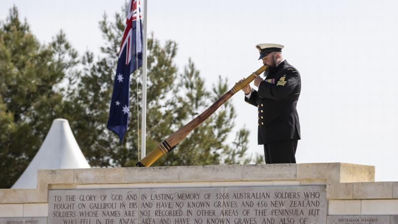 Petty Officer Jordan Bradshaw plays the didgeridoo at the Anzac Day commemorative service at Lone Pine, Gallipoli. Photo: Corporal David Cotton