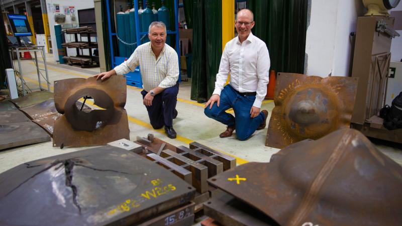 Dr Andrew Phillips, right, and welding engineer Joe Donato from the Defence Science and Technology Group at the DSTG research facility at Fishermans Bend in Melbourne. Photo: Sergeant Matthew Bickerton