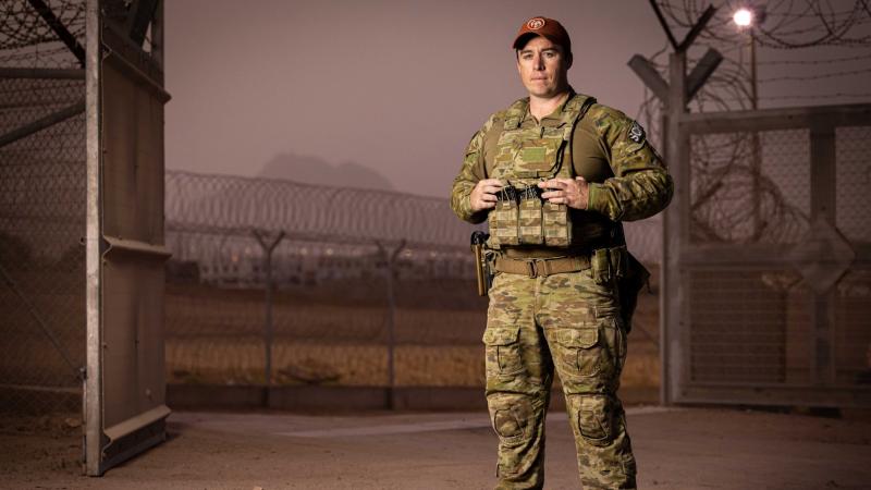 Australian Army Sergeant Troy Wyley stands at the front gate of the Multinational Forces and Observers South Camp on Operation Mazurka in South Sinai, Egypt. Photo: Corporal Jonathan Goedhart
