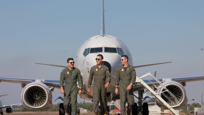 Airborne Electronics Analyst Corporal Sean Toogood, left, Pilot Flying Officer Isaac Stephenson and Airborne Electronics Analyst Corporal Thomas Inslay, from No. 11 Squadron, at RAAF Base Darwin. Photo: Leading Aircraftman Sam Price