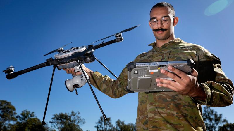 Drone operator Leading Aircraftman Sam Payda with a R70 Skyranger at the Air Force Drone Racing Tournament Exhibition day at RAAF Base Amberley. Photo: Leading Aircraftwoman Kate Czerny