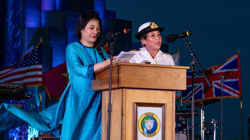 Royal Australian Navy Maritime Human Resources Officer Lieutenant Vicky Nguyen, right, acts as Master of Ceremonies during the Pacific Partnership 2022 opening ceremony. Photo: Supplied