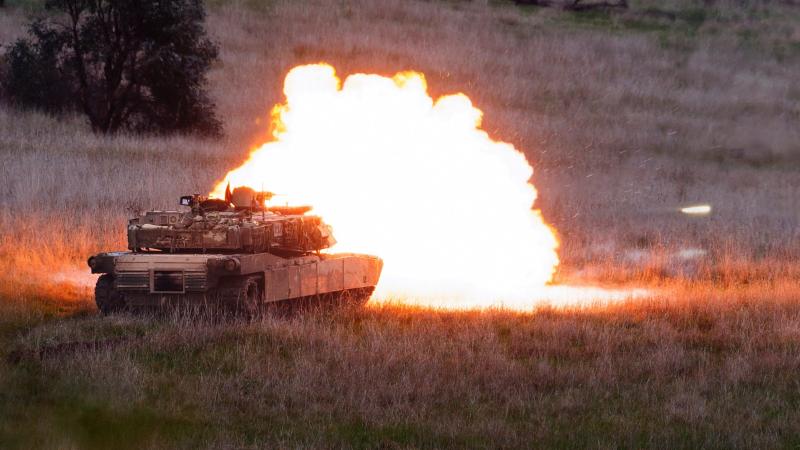 An Australian Army M1A1 Abrams main battle tank fires its main armament during Exercise Gauntlet Strike at Puckapunyal Military Training Area. Photo: Corporal Dustin Anderson