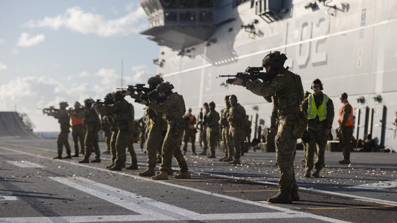 Soldiers from the 2nd Battalion, Royal Australian Regiment during a live fire shoot on board HMAS Canberra in the lead up to Excercise Rim of the Pacific 2022. Photo: Corporal John Solomon