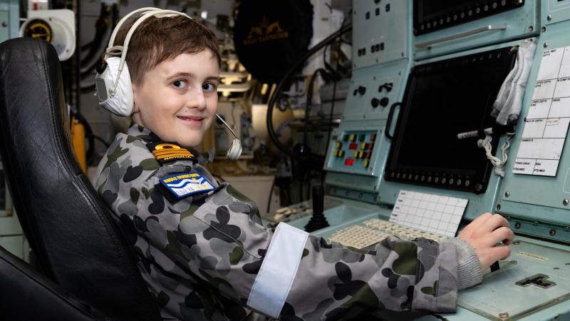 Ben operates a console in the operations room of Collins-class submarine HMAS Farncomb berthed at Fleet Base East in Sydney. Photo: Able Seaman Susan Mossop
