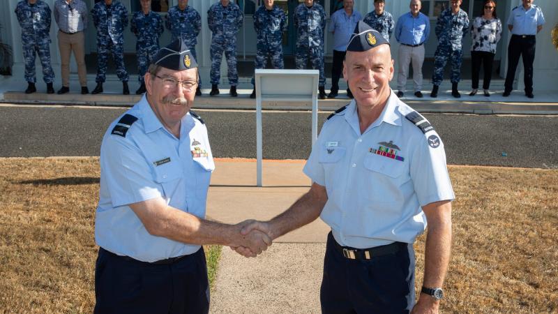 Air Commodore Christopher "Noddy" Sawade, left, with Air Commodore Michael "Micka" Gray at the Air Show Team Handover Ceremony at RAAF Base Darwin. Photo: Sergeant Pete Gammie