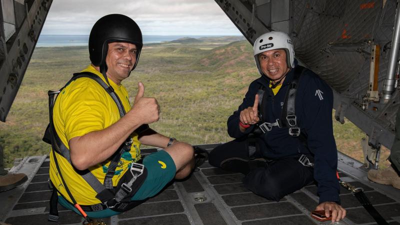 Australian Olympic Committee Indigenous Advisory Committee members and former Olympic athletes Kyle Vander-Kuyp (left) and Patrick Johnson during a flight over the Torres Strait Islands in an Air Force  C-27J. Photo: Leading Aircraftwoman Kate Czerny