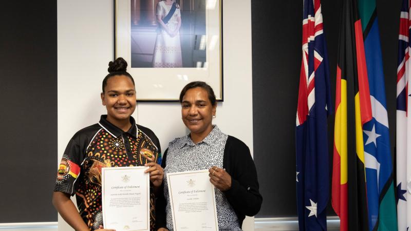 Mother and daughter duo, Scartisha Ningella, left, and Lucielle Jimbidie, at the Pilbara Regiment enlistment ceremony at Defence Force Recruiting in Perth. Photo: Corporal Nakia Chapman