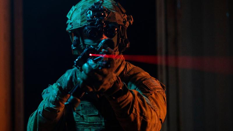 A Royal Australian Air Force Airfield Defence Guard from No. 2 Security Forces Squadron conducts a building clearance during Exercise Urban Nomad at RAAF Base Amberley. Photo: Leading Aircraftwoman Emma Schwenke