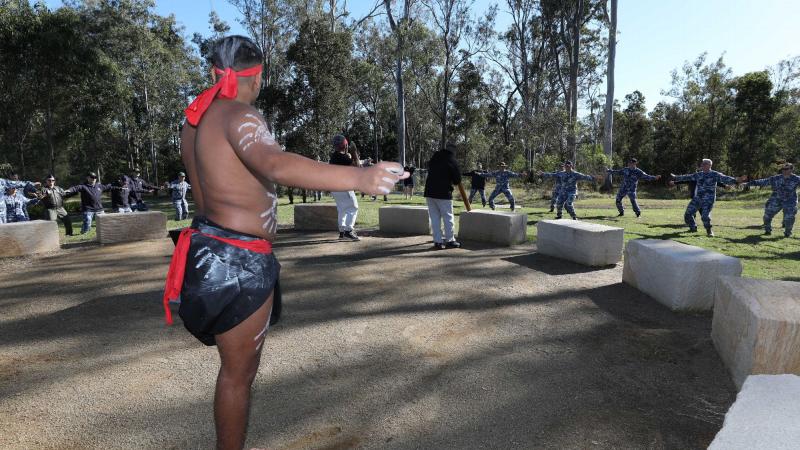 Lyric from the Nunukul Yuggera Dance Troupe leads the members and guests in a traditional dance at the opening of the Amberley Indigenous Cultural Precinct. Photo: Corporal Brett Sherriff