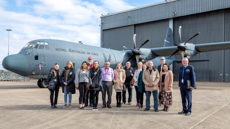 Participants of the Australian Industry Defence Network in front of a C-130J Hercules during a visit to RAAF Base Richmond. Photo: Corporal Dan Pinhorn