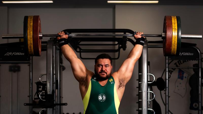 Leading Seaman Suamili Nanai conducts a weightlifting training session at HMAS Stirling gymnasium in preparation for the 2022 Commonwealth Games in Birmingham. Photo: Leading Seaman Craig Walton