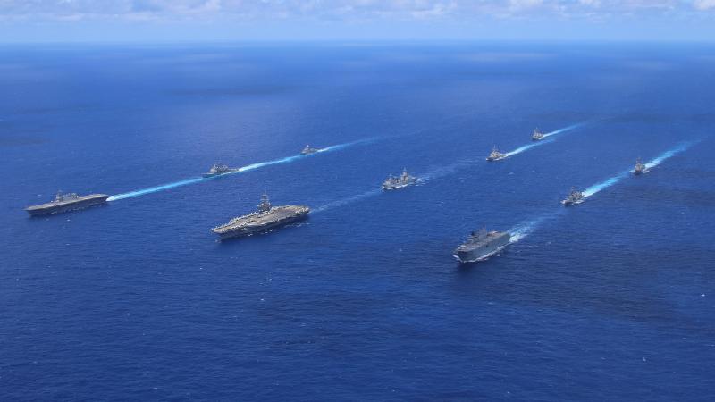 HMA Ships Canberra, Warramunga and Supply sail in formation with USS Abraham Lincoln, JS Izumo, USS Mobile Bay, USS Spruance, USS Gridley, JS Takanami, and USS Sampson in the Pacific Ocean. Photo: Leading Seaman Liam Sulley
