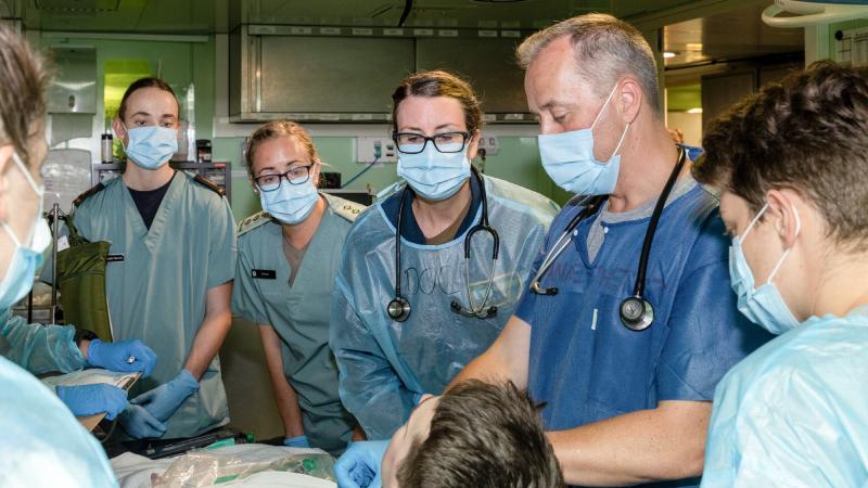Personnel from HMAS Canberra’s medical team take part in a simulated resuscitation exercise in the ship’s resuscitation bay during Exercise Rim of the Pacific (RIMPAC) 2022. Photo: Leading Seaman Matthew Lyall