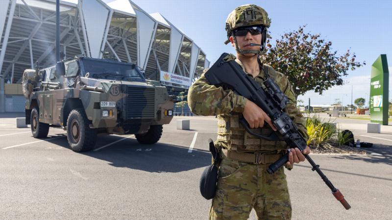 Army Reservist Private Abbas Foladi, from the 25/49 Battalion, Royal Queensland Regiment, patrols the grounds of the Queensland Country Bank Stadium as part of Exercise Austral Shield 2022 in Townsville. Photo: Corporal Jonathan Goedhart