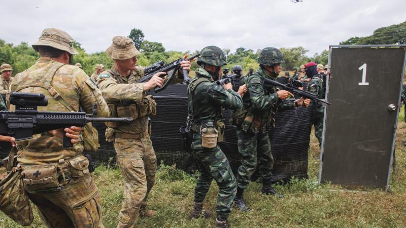 Australian Army soldiers from Rifle Company Butterworth 136, together with members of the Royal Thai Army, practice close quarter battle drills during Exercise Chapel Gold 2022 in Nakhon Sawan, Thailand. Photos: Corporal Cameron Pegg