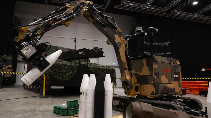 An automatic resupply mechanical handling system is demonstrated at the Army Robotics Expo in Adelaide. Photos: Warrant Officer Class Two Max Bree