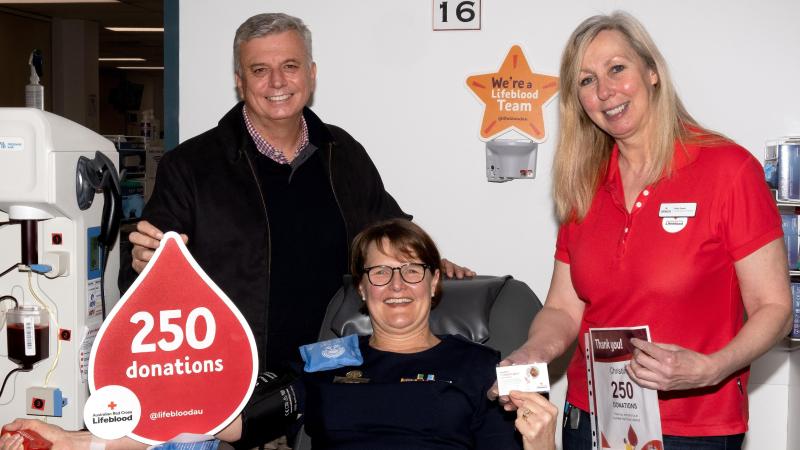 Flight Sergeant Christine Williams, with her husband Warren, at the Lifeblood Canberra Garran Donor Centre on the occasion of her 250th blood donation. Photo: Flight Sergeant Kev Berriman
