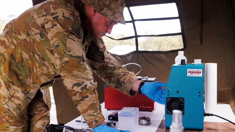 Trade Conductor Warrant Officer Class One Jason Hartley from 17th Sustainment Brigade works in the fuel quality control centre during Exercise Overland - Nautical Petros at Cowley Beach Training Area. Photo: Corporal Dustin Anderson