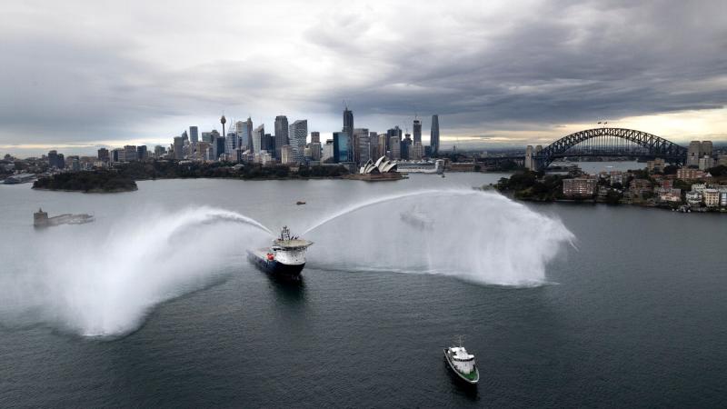 Pacific support vessel Reliant conducts a water display in front of Sydney Harbour Bridge after a formation entry into Sydney Harbour with MV Mercator, and Multi-role Aviation Training Vessel MV Sycamore. Photos: Able Seaman Susan Mossop