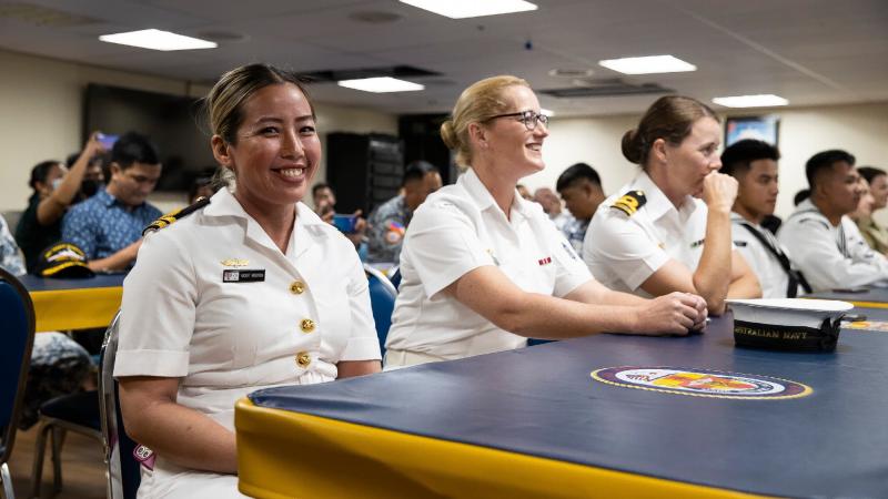 Royal Australian Navy Gender, Peace and Security Adviser Lieutenant Vicky Nguyen, left, during the Pacific Partnership 2022 closing ceremony in Palawan, Philippines. Photo: Corporal Brandon Grey