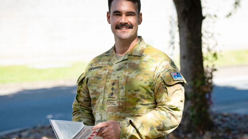 Captain Dylan Conway from the 6th Battallion, Royal Australian Regiment, has launched the second annual charity fundraising event, the Brothers N Books Read-A-Thon. Photo: Major Roger Brennan