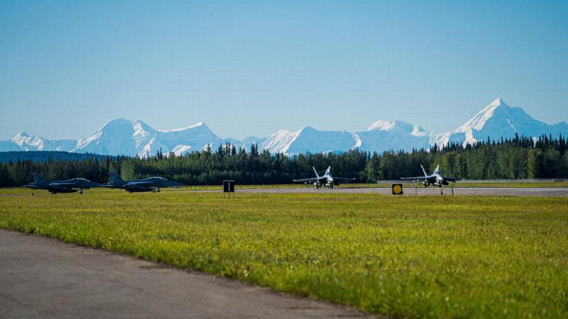 Four RAAF F/A-18F Super Hornets prepare for a mission at Eielson Air Force Base for Exercise Red Flag Alaska. Photos: Captain Benjamin Tait