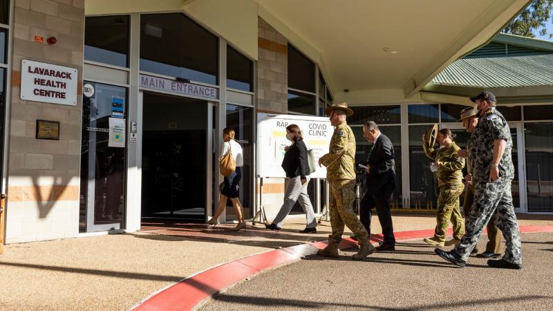 Commander of the 3rd Brigade Brigadier Kahlil Fegan escorts Royal Commissioner Mr Nick Kaldas to the Lavarack Health Centre. Photo: Corporal Brodie Cross
