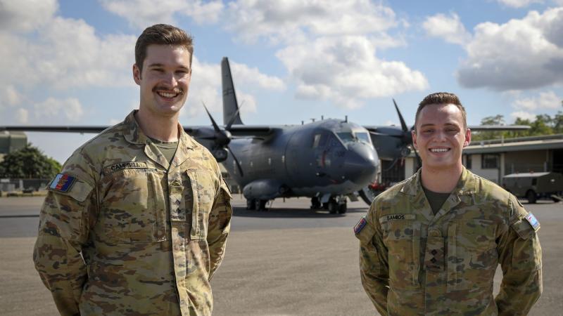 Lieutenant's Fraser Campbell, left, and William Samios on the flight line at Air Transport Wing, during Operation Kimba, Papua New Guinea. Photo: Sergeant Kirk Peacock