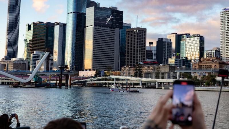 Crowds catch the action as an F/A-18F Super Hornet flies low and fast to celebrate the opening of the Brisbane Festival's Riverfire on September 3. Photos: Corporal Brett Sherriff