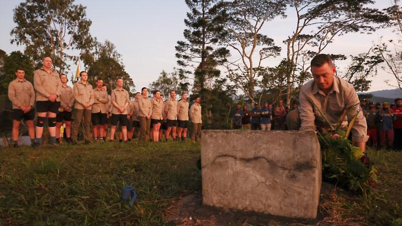 Lieutenant Colonel Leigh Partridge lays a wreath during a dawn service commemorating 80 years since the start of the Battle of Brigade Hill. Photo: WO2 Max Bree