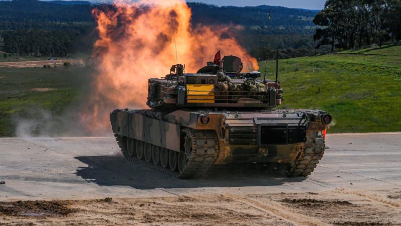 A M1A1 Abrams main battle tank engages a target during the Coral-Balmoral Cup 2022 at the Puckapunyal Military Area, Victoria. Photo: Private Michael Currie