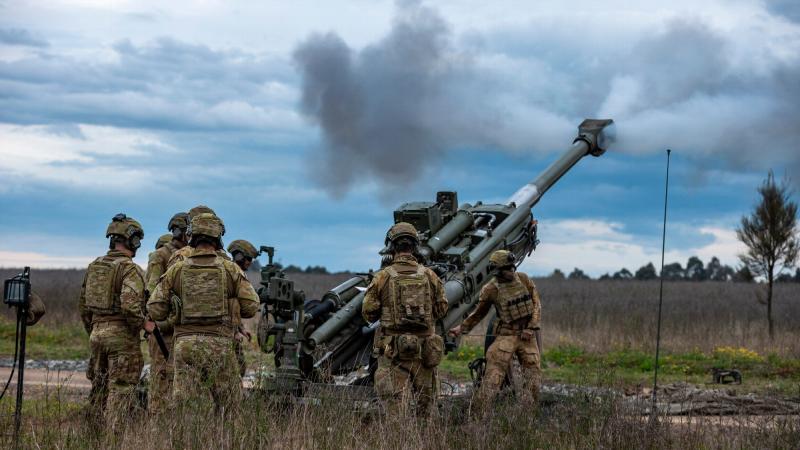 Gunners from 1st Regiment, Royal Australian Artillery, fire the M777A2 155mm howitzer during Exercise Long Tan at Lone Pine Barracks in Singleton. Photos: Corporal Nicole Dorrett