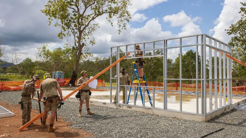 Australian Army, British Army and Papua New Guinea Defence Force sappers work together at a construction site during Exercise Puk Puk at Goldie River Training Depot in Papua New Guinea. Photo: Sergeant Nunu Campos