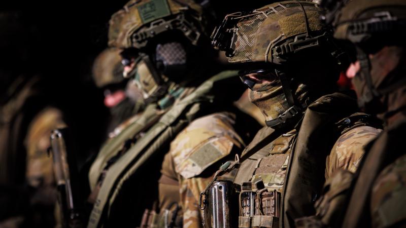 An Australian Army soldier from the 1st Battalion, Royal Australian Regiment, prepares to conduct wet and dry exercise rehearsals during Exercise Sea Raider 2022. Photos: Corporal Cameron Pegg