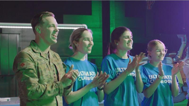 Captain Zac Bryant, from 6th Engineer Support Regiment, with students during the bridge-building challenge on Ultimate Classroom. Photo: Channel 10