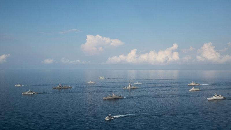 Ships participating in Exercise Kakadu 2022 sail in formation during a photo exercise off the coast of Darwin. Photo: Leading Seaman Tara Morrison