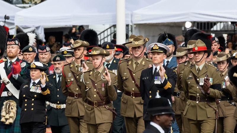 The Commonwealth contingent, made up of Australian, Canadian and New Zealand military personnel, marches on the procession route during the Queen’s state funeral in London. Photo: Sergeant Jarrod McAneney