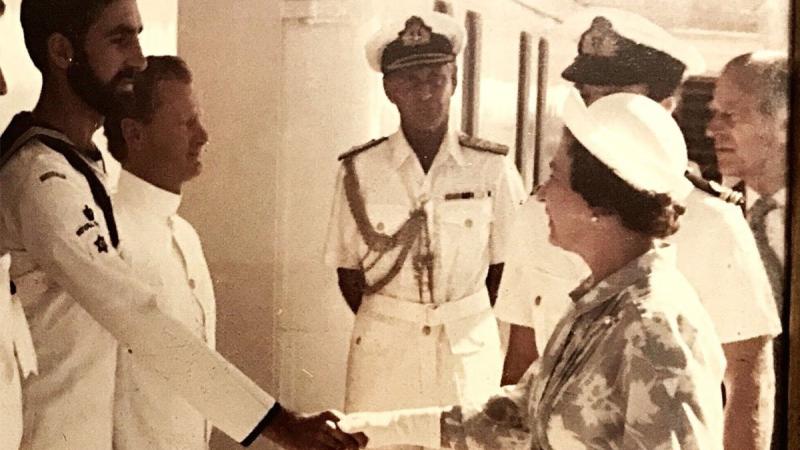 Captain Mark McConnell meets the Queen on board the Royal Yacht Britannia in 1986.