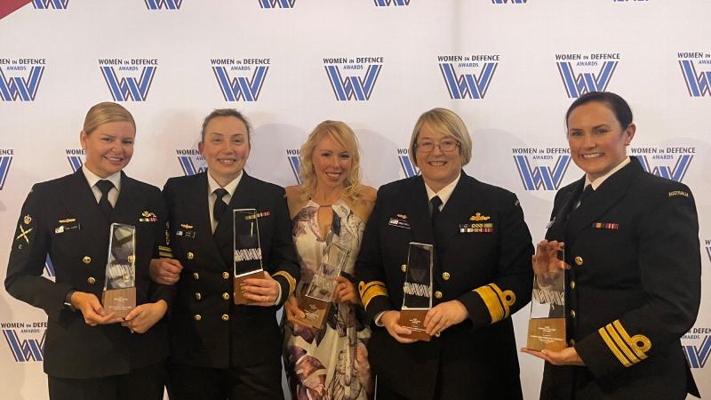 Petty Officer Sara Clarke, Lieutenant Commander Victoria Jnitova, Lieutenant Commander Cerys Joyce, Rear Admiral Wendy Malcolm and Commander Penelope Twemlow with their Women in Defence Awards.